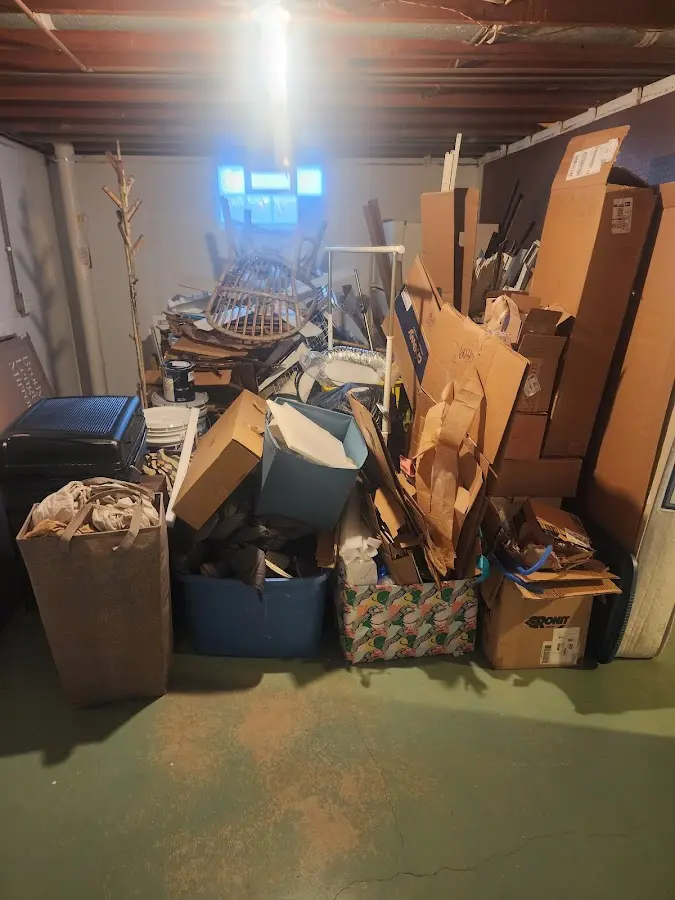 Roll-off dumpster container at job site for 2 Yard Dumpster Rental in Rutherford